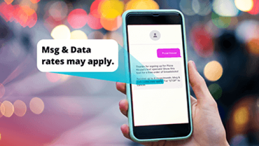 Illustration of a smartphone with the message blurred aside from the “Msg & Data rates may apply” copy